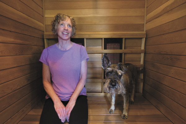 (Gabe Green | The Daily World) Sheri and her dog often sit and enjoy the sauna together.