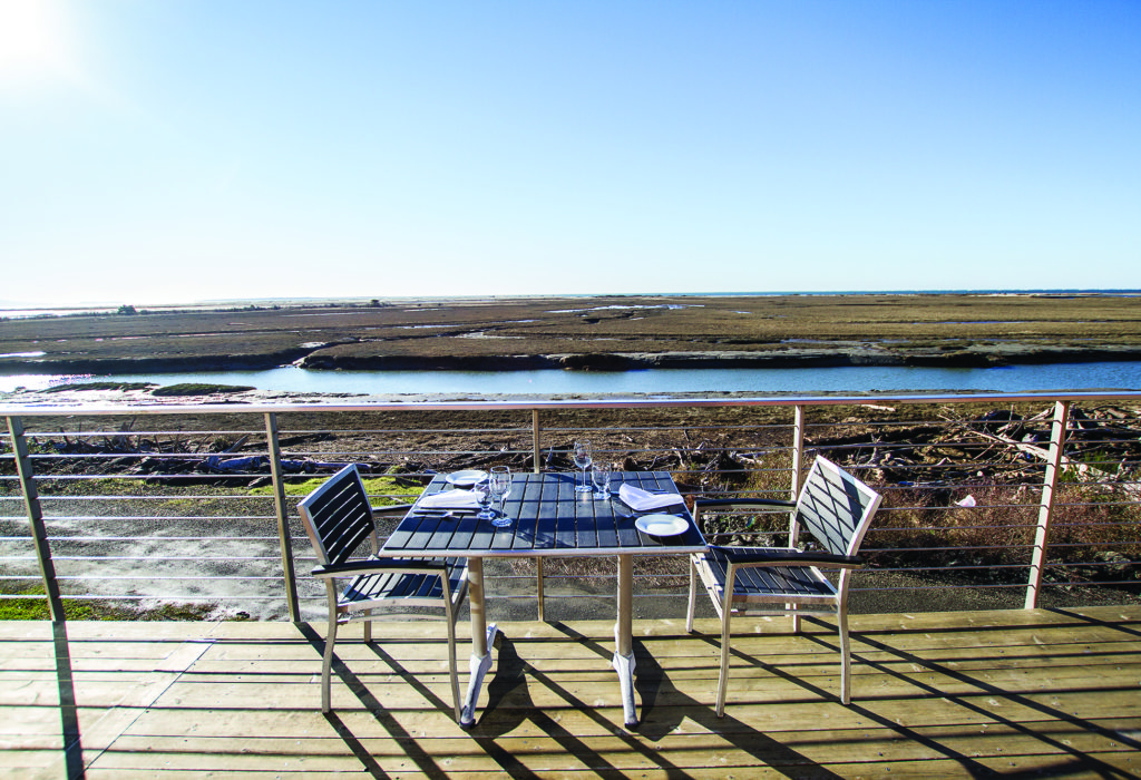 (Kyle Mittan | The Daily World) Sand Verbena's patio offers sweeping views of Tokeland's mudflats and the Pacific Ocean.