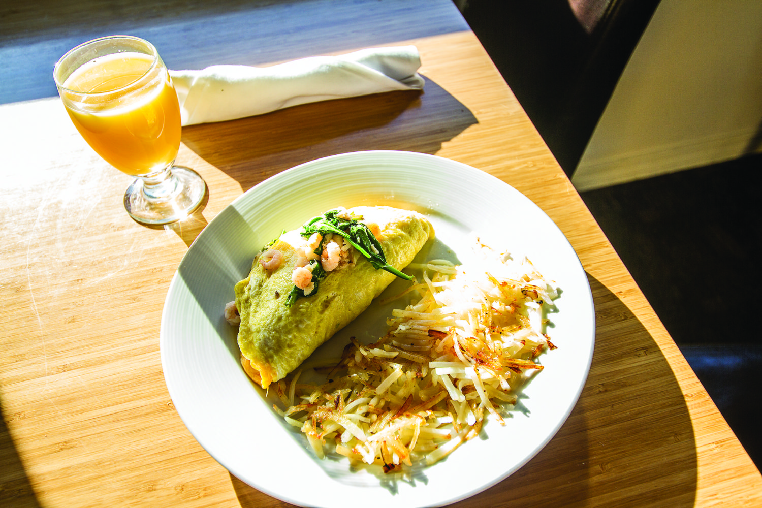 Shoalwater omelet features local Dungeness crab, bay shriimp, cheddar cheese and spinach