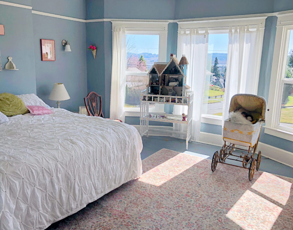 This large second-floor bedroom is in the front of the house, with a view of downtown Aberdeen and Grays Harbor.