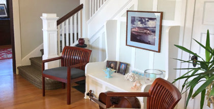 A large entryway greets visitors through a pair of front doors. Sliding doors can be used to partition one half of the house from the other. This is the left side’s foyer.